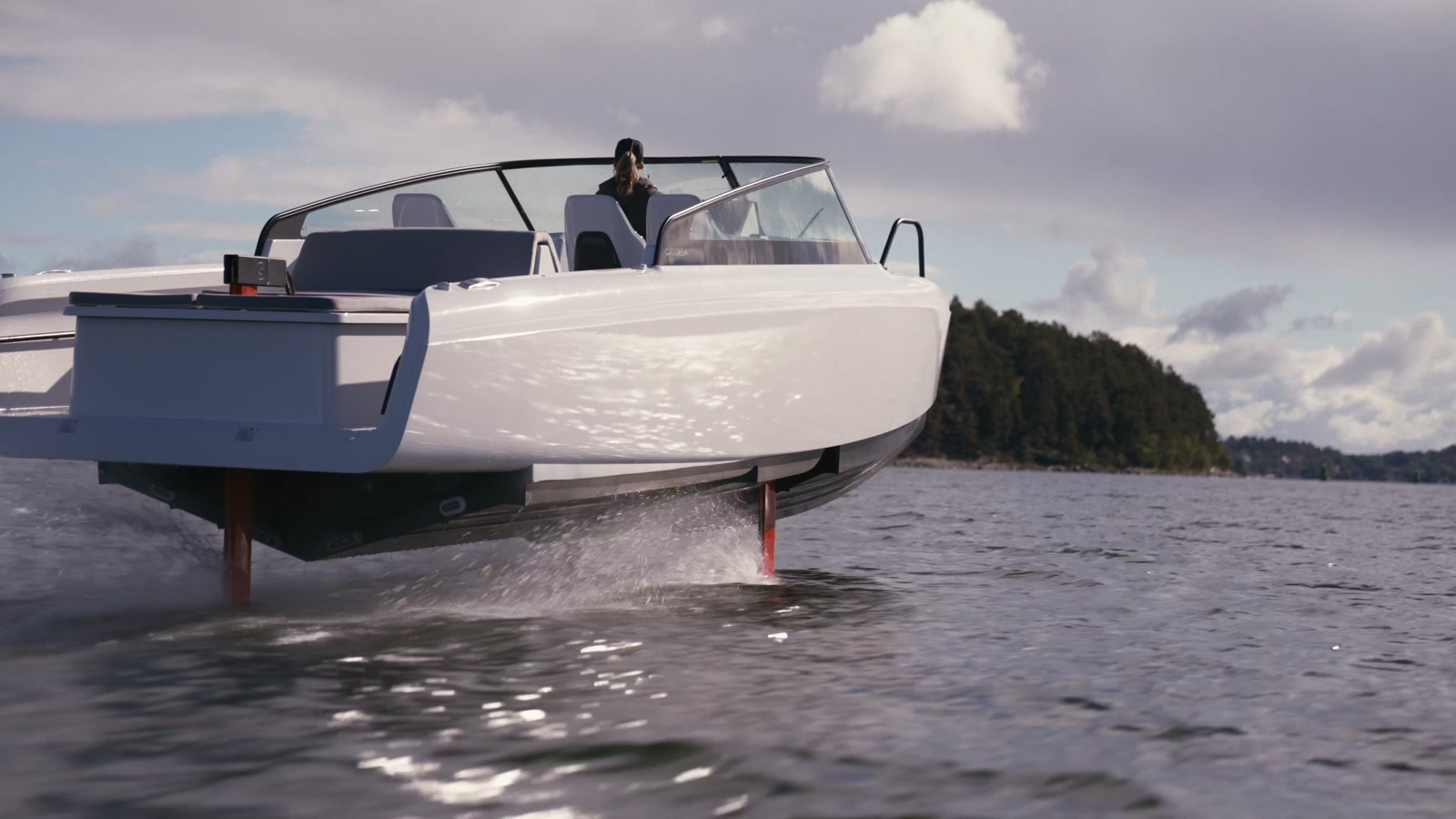 Candela’s electric C-8 flying above the water on its hydrofoils.